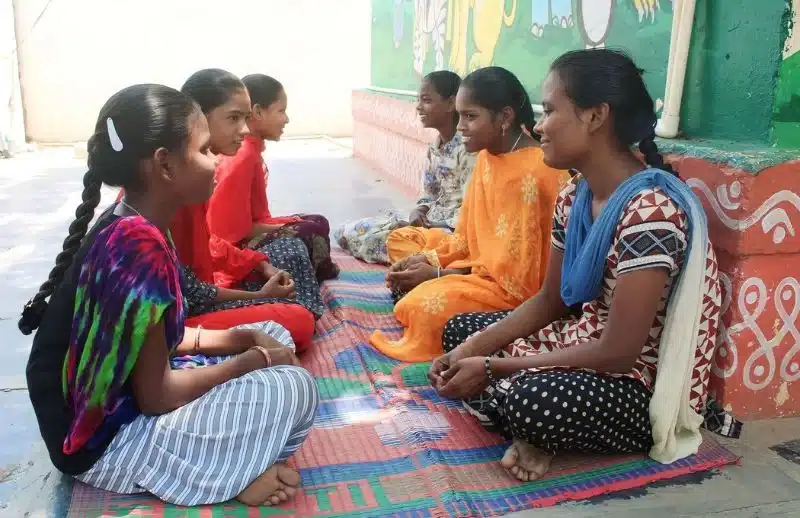 Girls from India Sitting and Talking Together